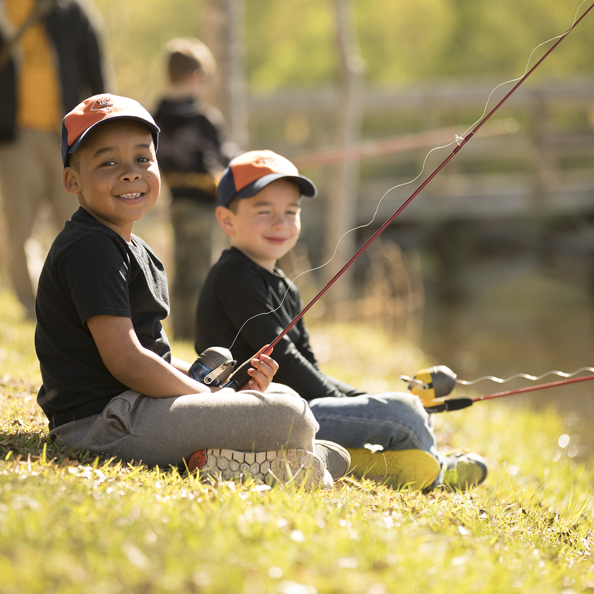 Two Cub Scouts fishing
