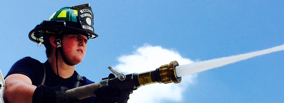 An Explorer sprays a firehose
