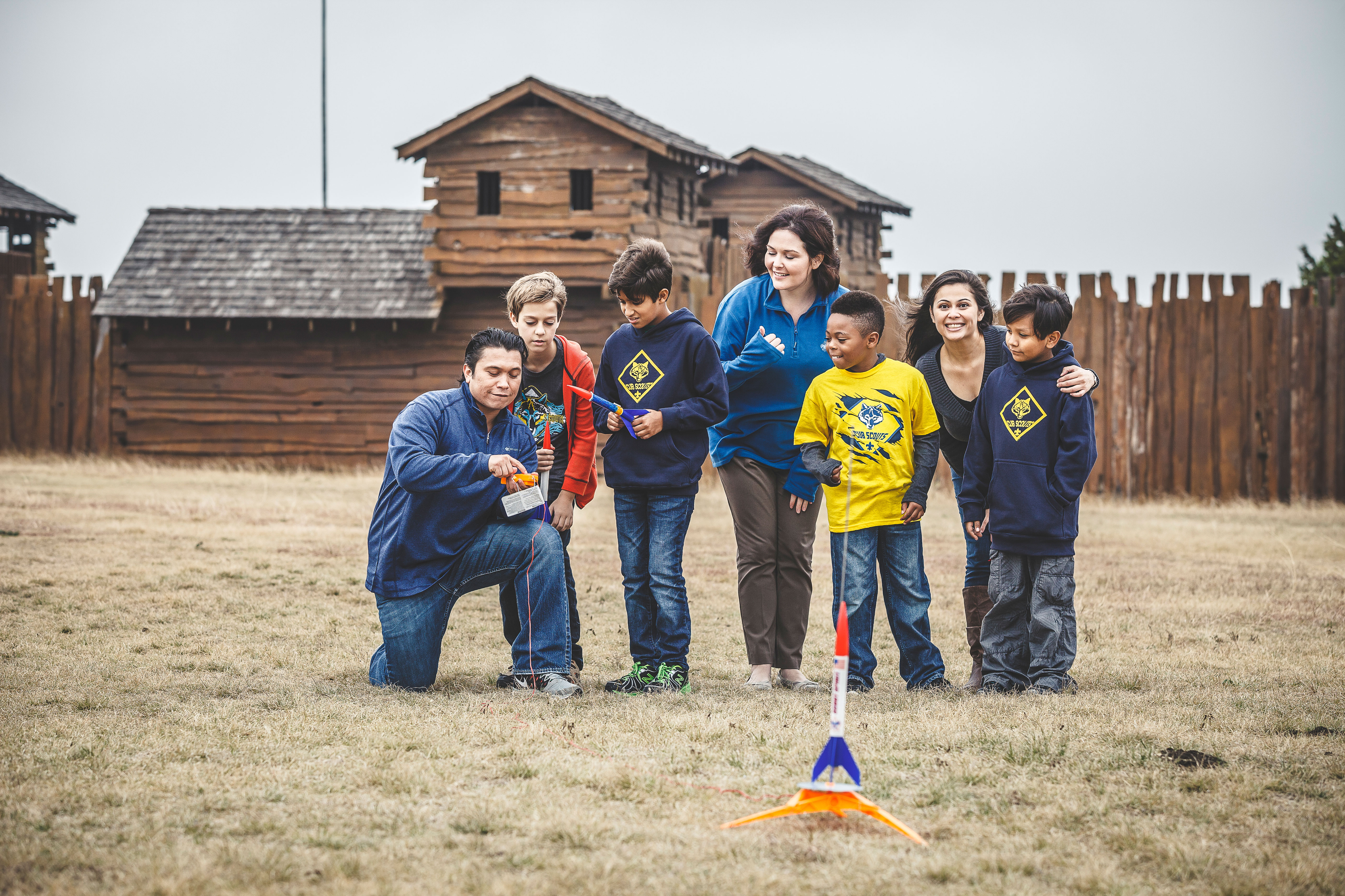 Cub Scouts launch a rocket with help from mom and dad