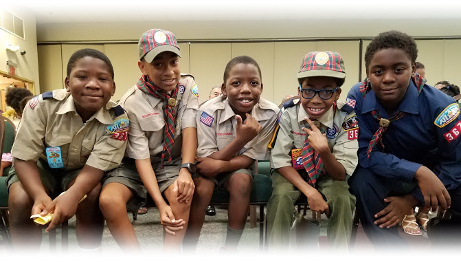 Four Scouts in the Scoutreach program